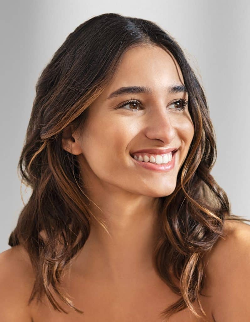 Young woman with hazel eyes smiling | Medical Aesthetics & Wellness of Modesto