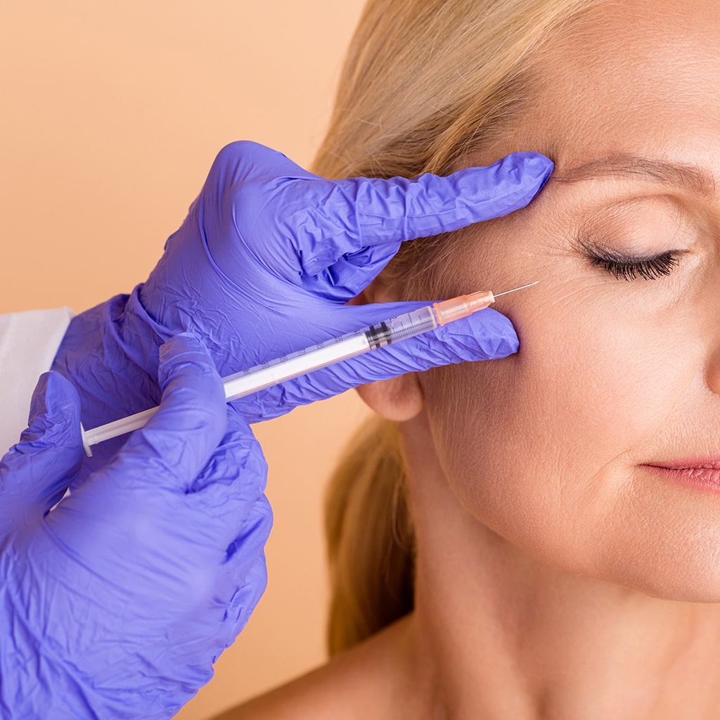 Applying stem cell serum during skin rejuvenation in Modesto