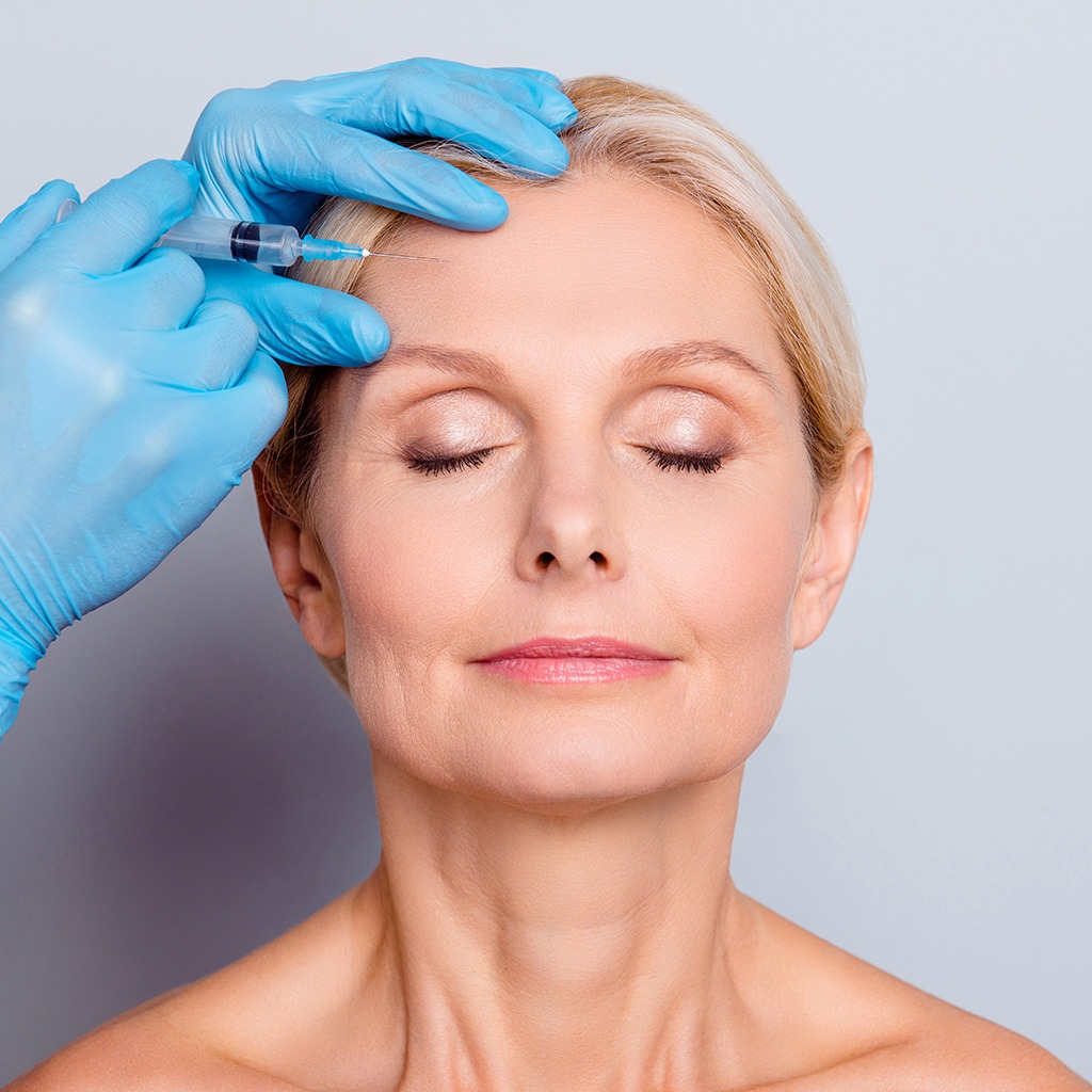 Woman receiving Botox injection in forehead at Medical Aesthetics & Wellness of Modesto clinic in Modesto, California